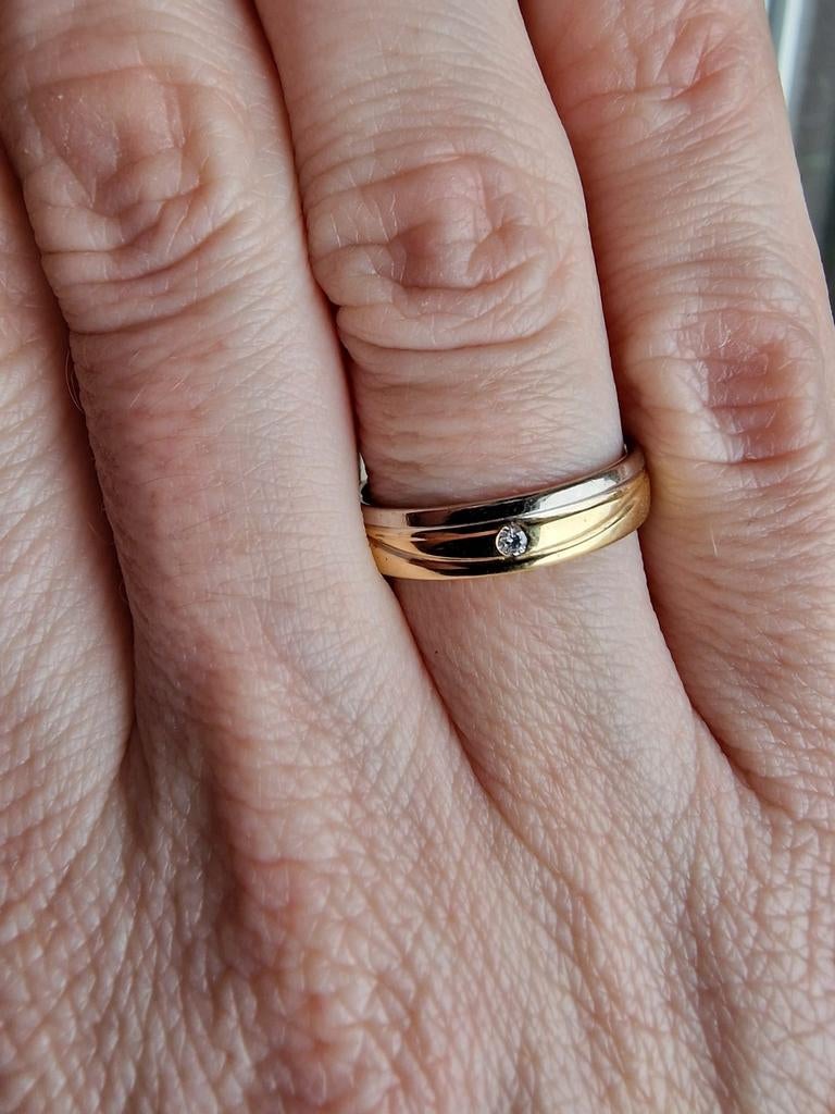 18 krt bicolor ring met briljant geslepen diamant 0.04krt, Ophalen of Verzenden, Zo goed als nieuw, 17 tot 18, Met edelsteen