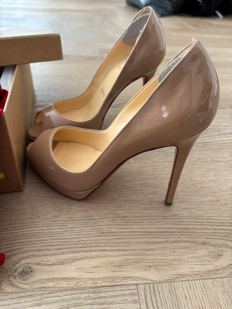 Christian Louboutin, Ophalen of Verzenden, Zo goed als nieuw, Zwart, Sneakers of Gympen