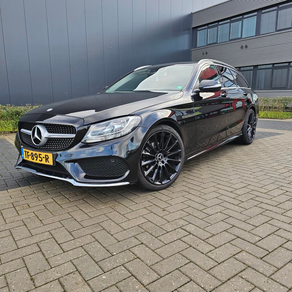 Mercedes-Benz C-Klasse C180 1.6 115KW Estate 2015 Zwart, Auto's, Mercedes-Benz, Achterwielaandrijving, 1370 kg, Leder en Stof