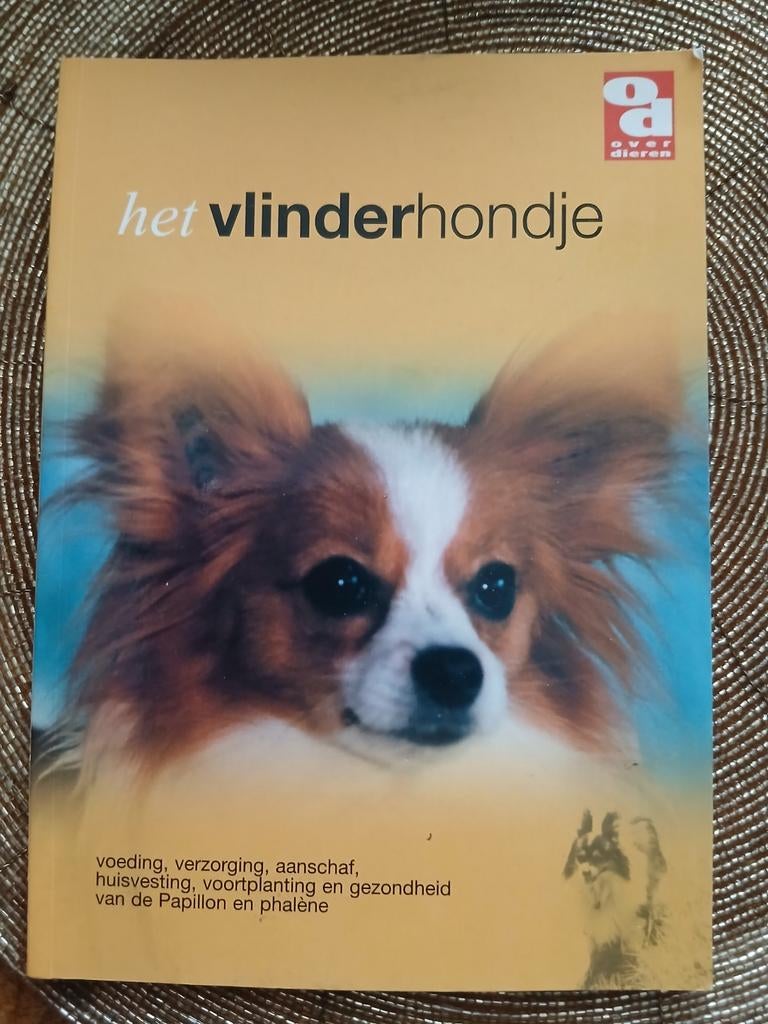 Het vlinderhondje, Ophalen of Verzenden, Zo goed als nieuw, Honden