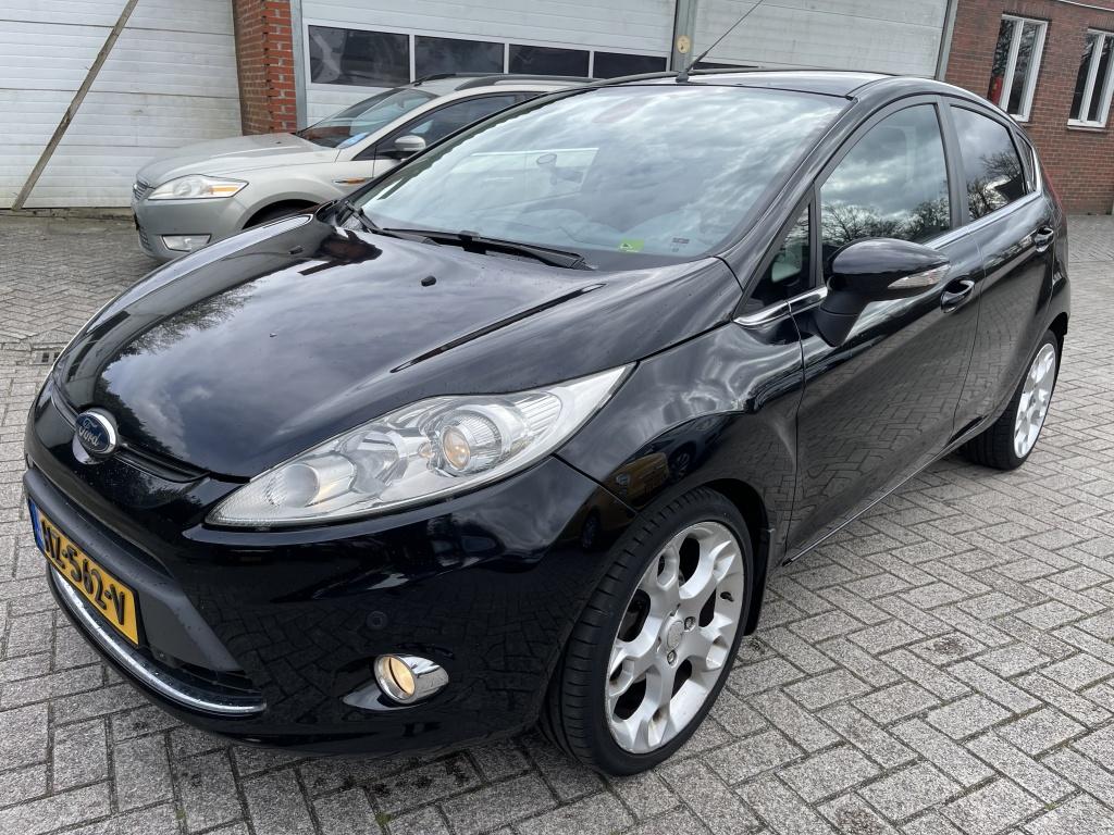 Ford Fiesta 1.6 Ghia Airco Navigatie (bj 2009), Voorwielaandrijving, 1596 cc, Zwart, Bedrijf