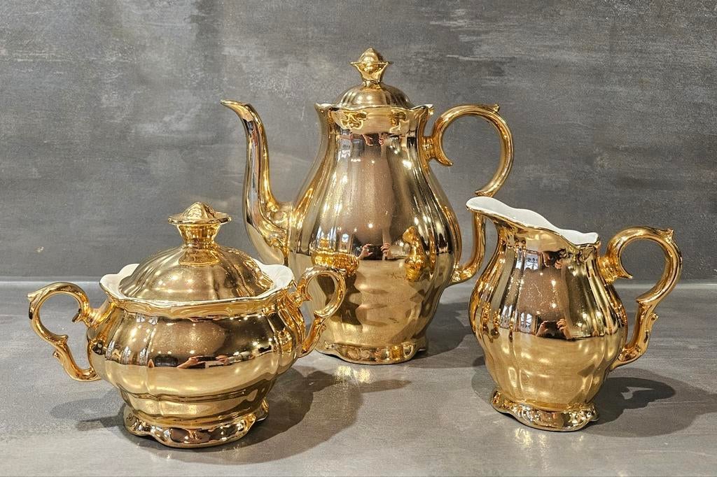 Goudkleurige theeset van MZ Altrohlau (Czech Republic), Antiek en Kunst, Ophalen of Verzenden