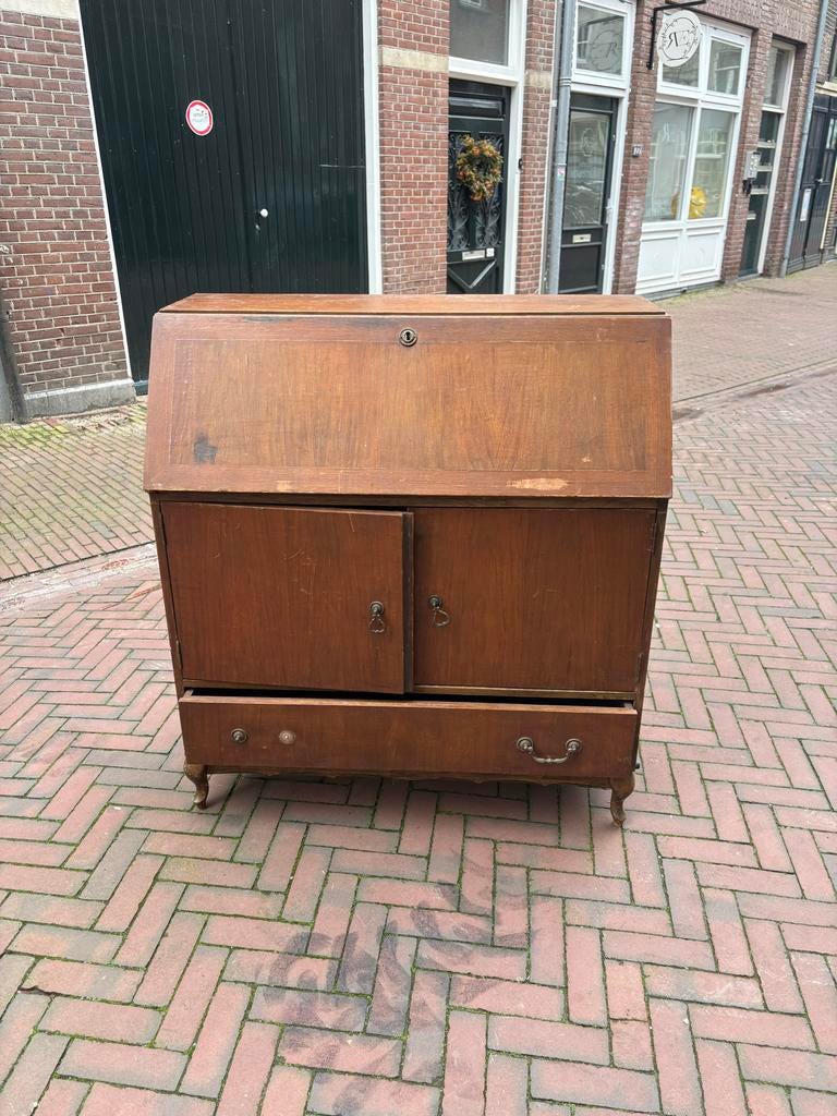 Oude schrijftafel, Ophalen