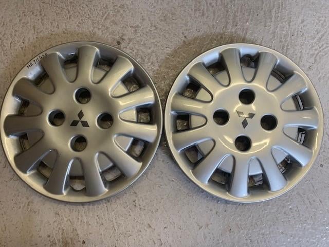 Mitsubishi wieldoppen 14 inch (2 stuks), Ophalen of Verzenden, Zo goed als nieuw