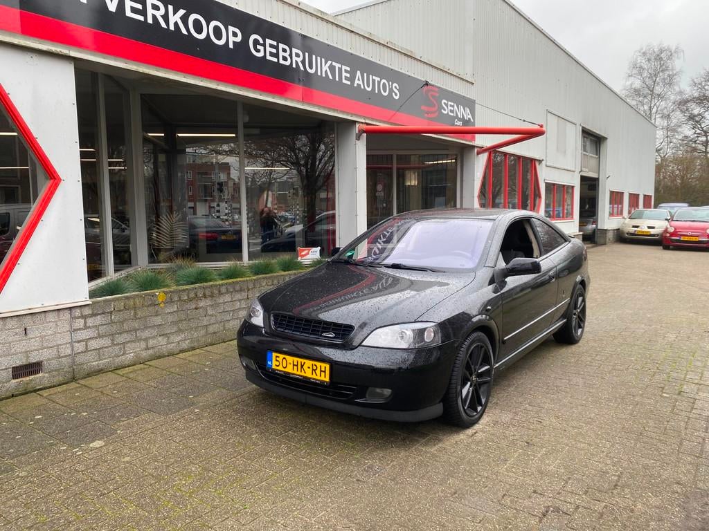 Opel Astra Coupé 2.2-16V - Full Black Edition - Inruil Mog, Voorwielaandrijving, Gebruikt, 4 stoelen, Zwart