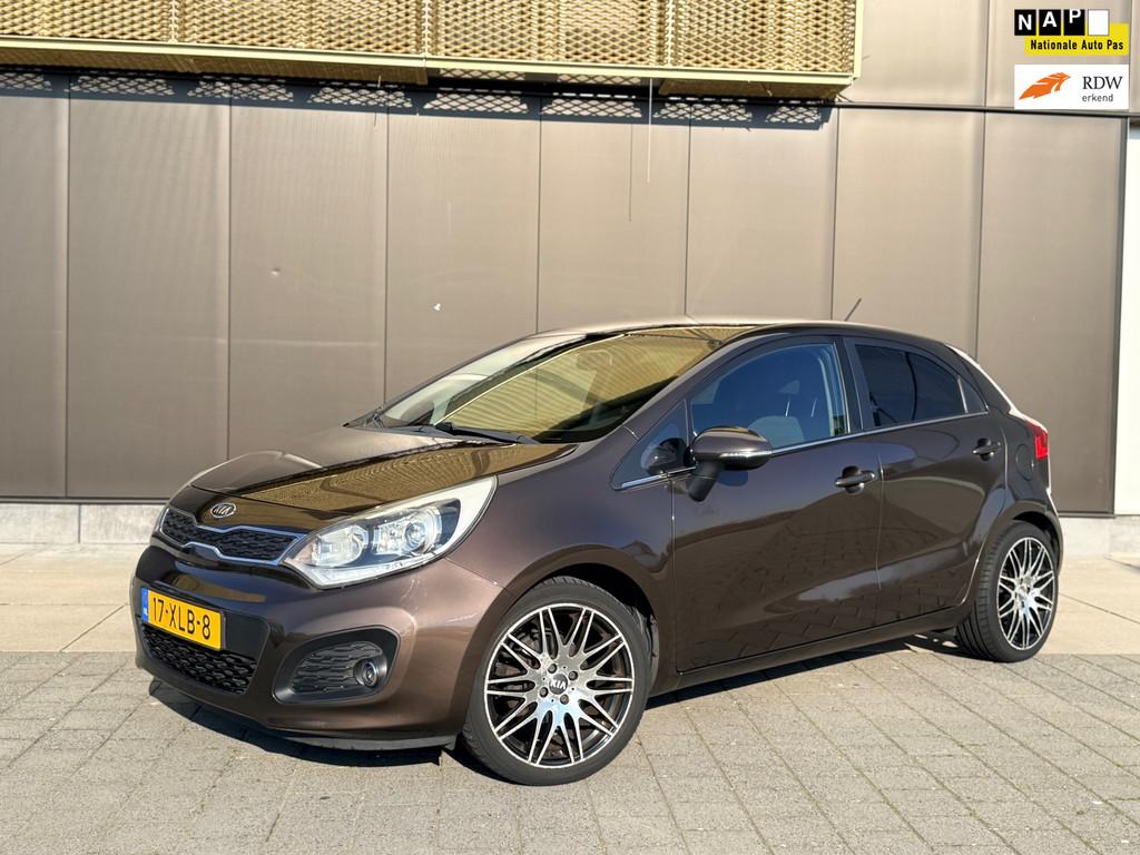 Kia Rio 1.2 CVVT SuperPack | Keyless | Cruise | Clima | Park, Euro 5, Zwart, 4 cilinders, Bruin