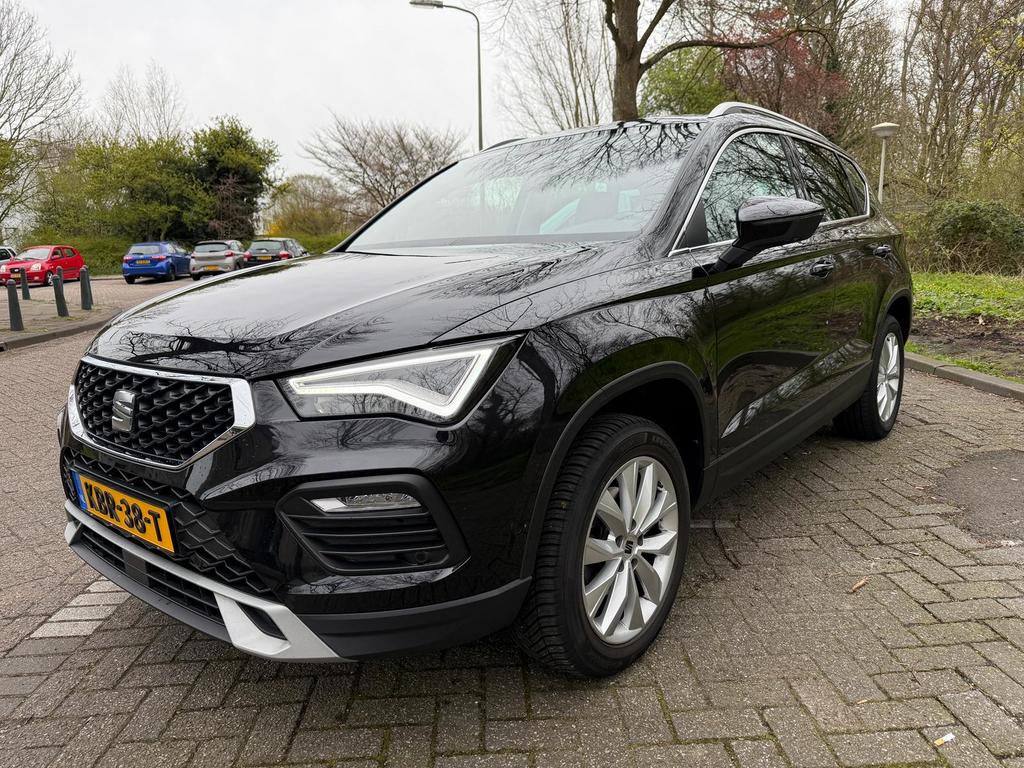 Seat Ateca 1.5 Ecotsi 150pk Dsg-7 2023 Zwart, Auto's, Seat, Stof, 1498 cc, 4 cilinders, Ateca