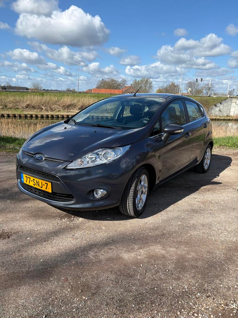 Ford Fiësta 1.25 44KW 5DR 2011 Grijs, Auto's, Voorwielaandrijving, Stof, 1242 cc, 4 cilinders