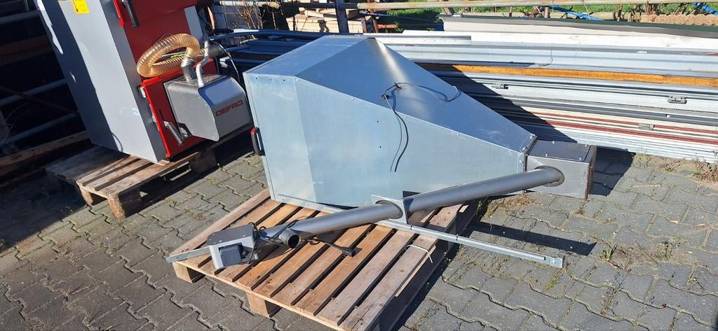 Defro pelletkachel met bunker, Ophalen