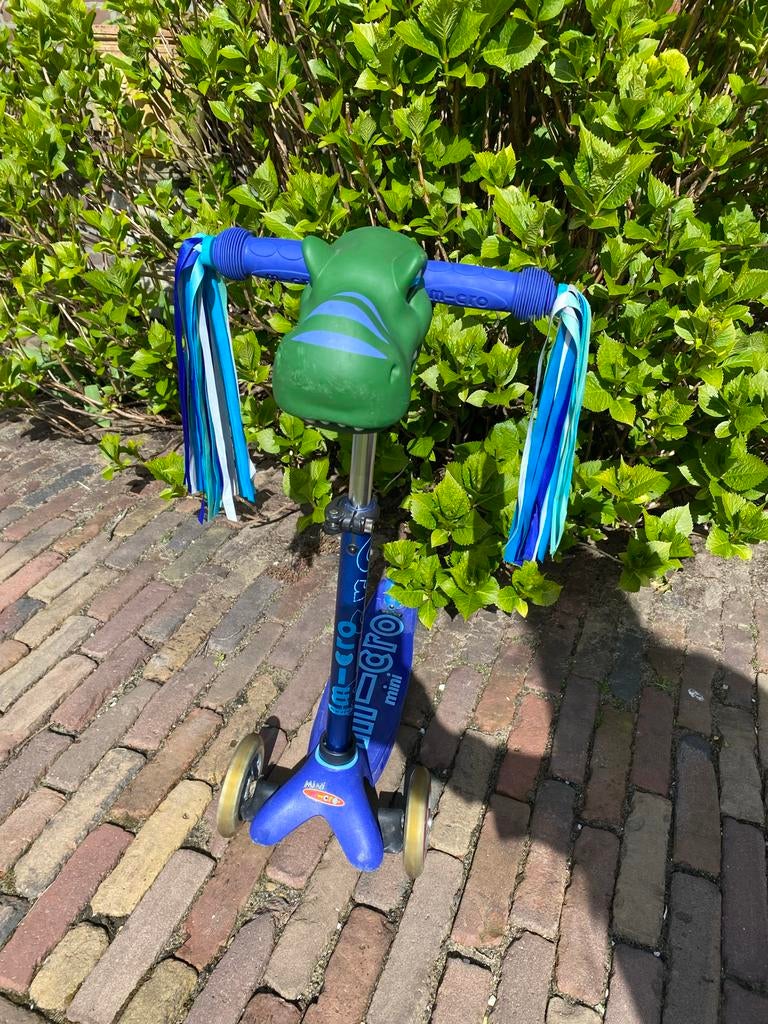 Mini Micro step met dinosaurushoofd en slierten blauw, Ophalen, Zo goed als nieuw