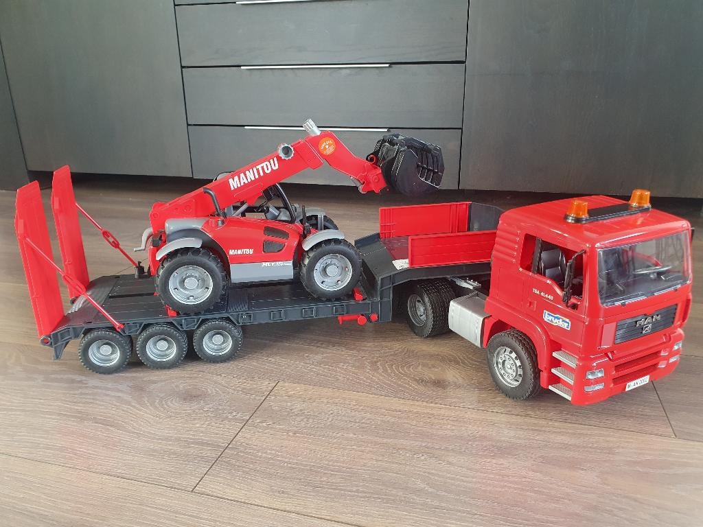 Bruder vrachtwagen MAN TGA dieplader met Manitou  verreiker, Ophalen of Verzenden, Gebruikt