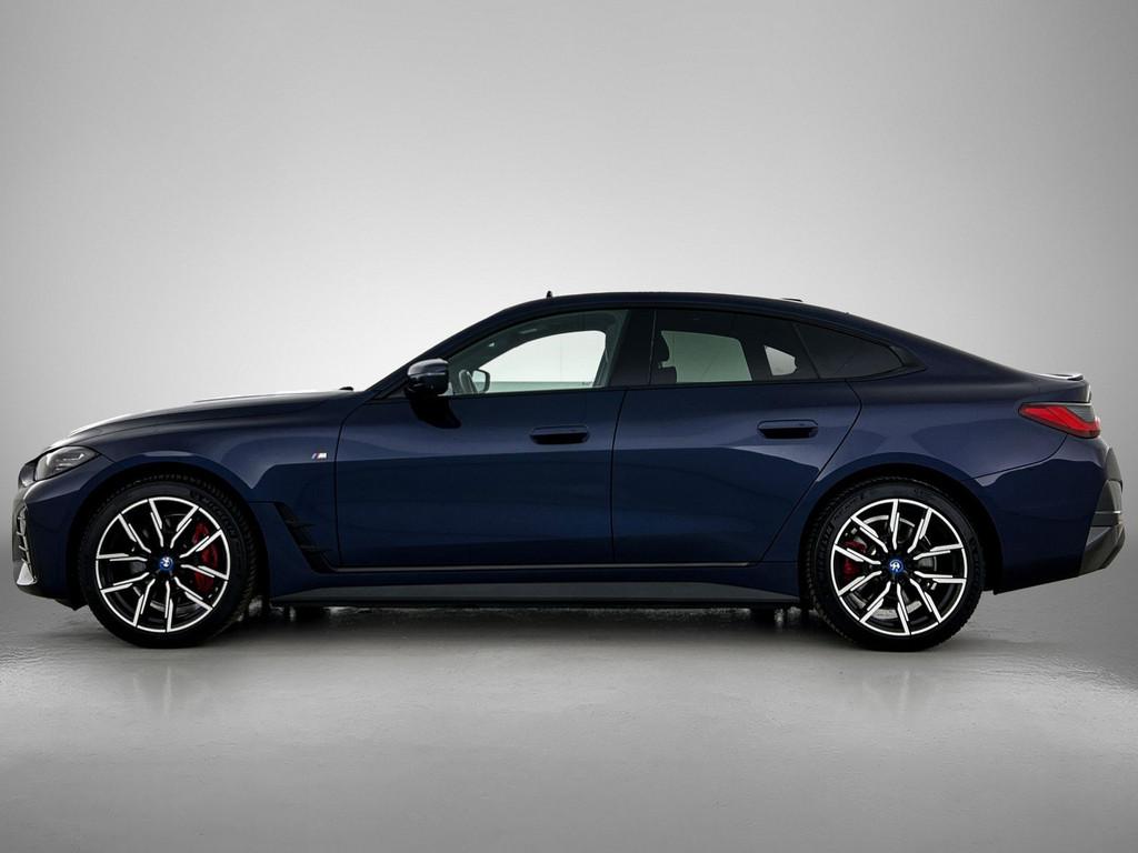 BMW i4 eDrive40 High Executive 84 kWh | M Sportpakket Pro |, Gebruikt, Zwart, Blauw, Adaptive Cruise Control