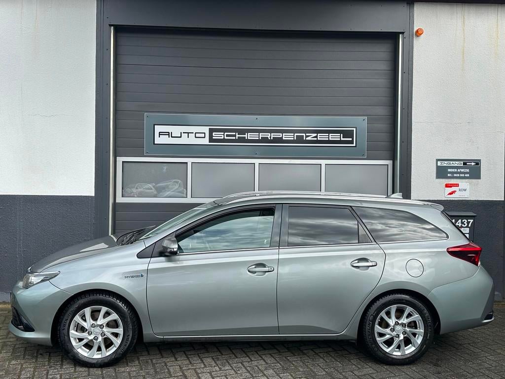 Toyota Auris 1.8 Hybrid Lease Pro | PANO | NAVI | NL AUTO, Gebruikt, Euro 6, Grijs, Te koop