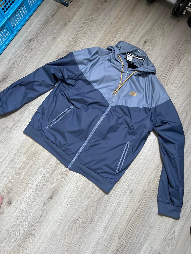 Nike Windrunner Jacket - Grijs/Blauw Maat L, Kleding | Heren, Jassen | Zomer, Ophalen, Nieuw, Maat 52/54 (L), Grijs