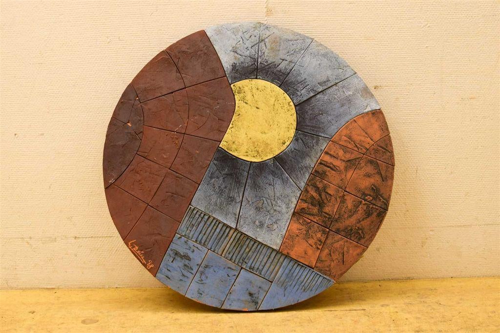 Ronde wandtegel in stukken 49716