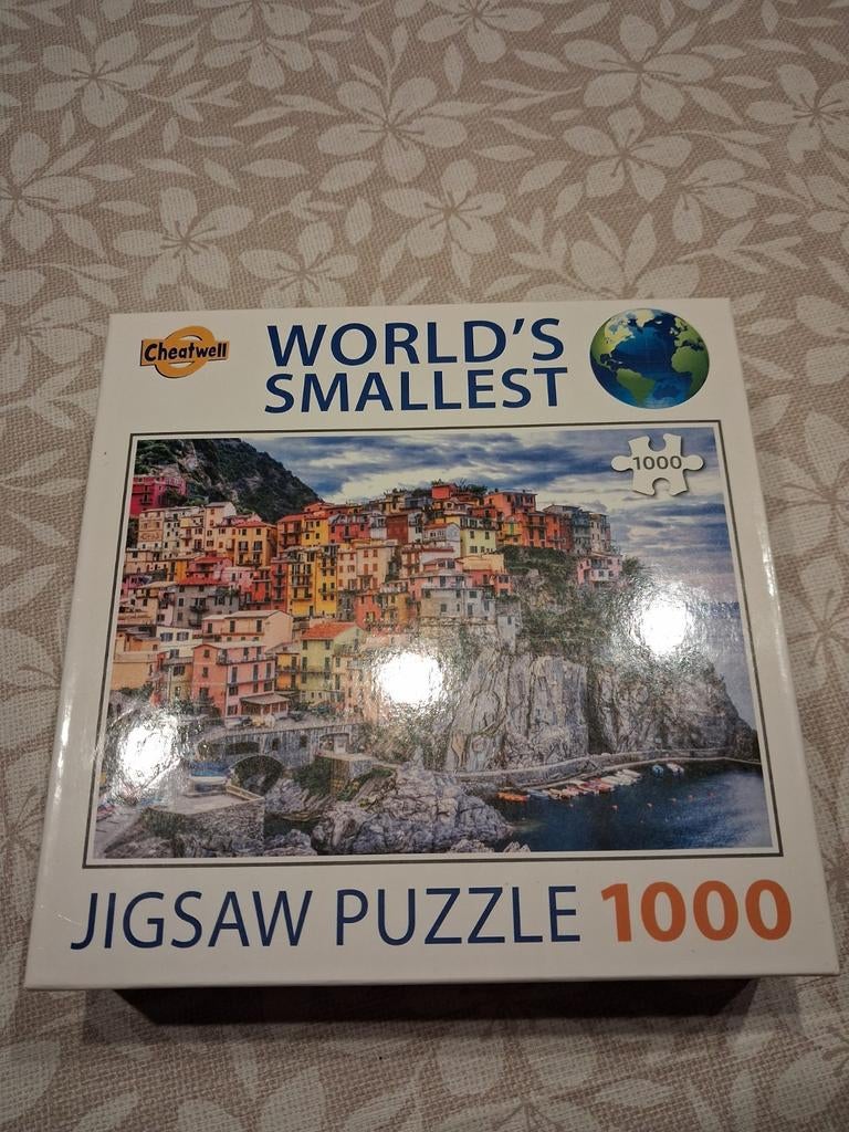 Werelds kleinste puzzel van Jigsaw 1000 stukjes, Hobby en Vrije tijd, Denksport en Puzzels, Ophalen of Verzenden, 500 t/m 1500 stukjes