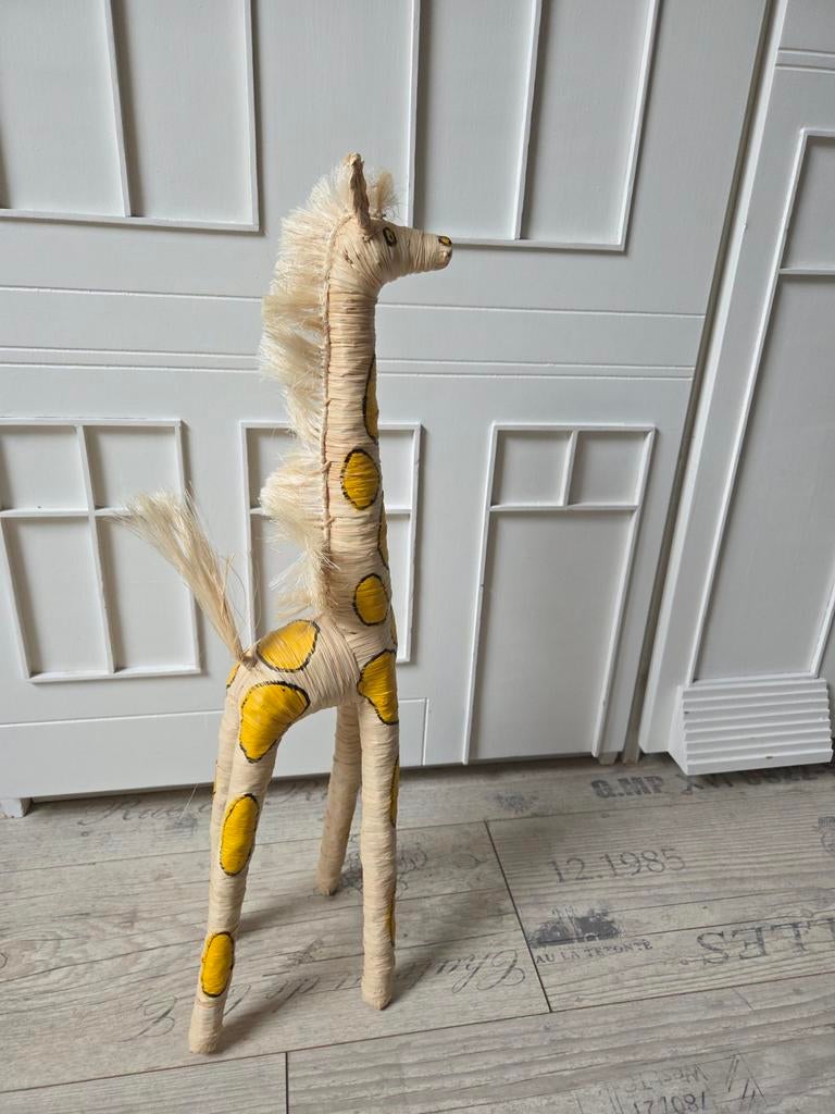 Handgemaakte Giraf, Ophalen