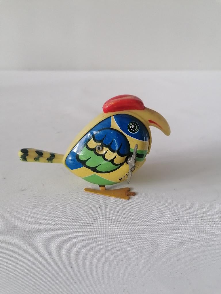 12x7 cm groot blikken vogel, Antiek en Kunst, Antiek | Speelgoed, Ophalen of Verzenden