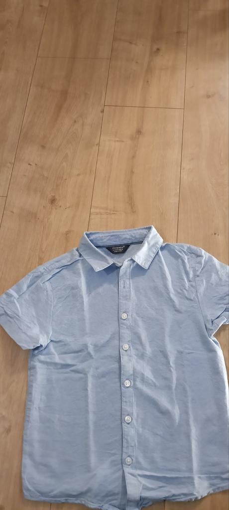 Lichtblauwe Polo Primark 140, Kinderen en Baby's, Kinderkleding | Schoenen en Sokken, Ophalen of Verzenden