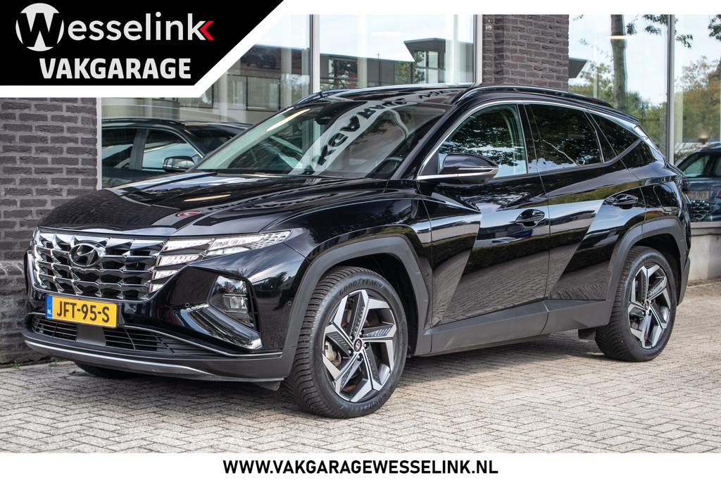 Hyundai Tucson 1.6 T-GDI PHEV Premium Sky 4WD | Navi | Stoel, Gebruikt, 4 cilinders, Zwart, Leder