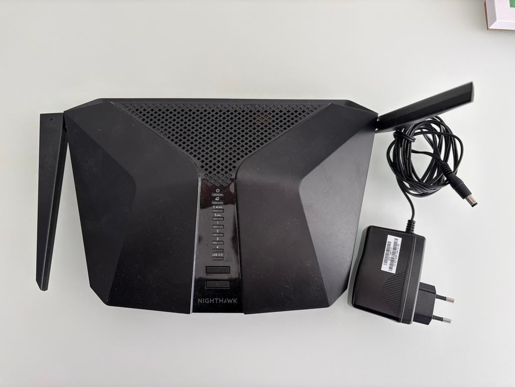 Netgear Nighthawk AX4 router RAX40, Ophalen of Verzenden, Gebruikt, Router met modem