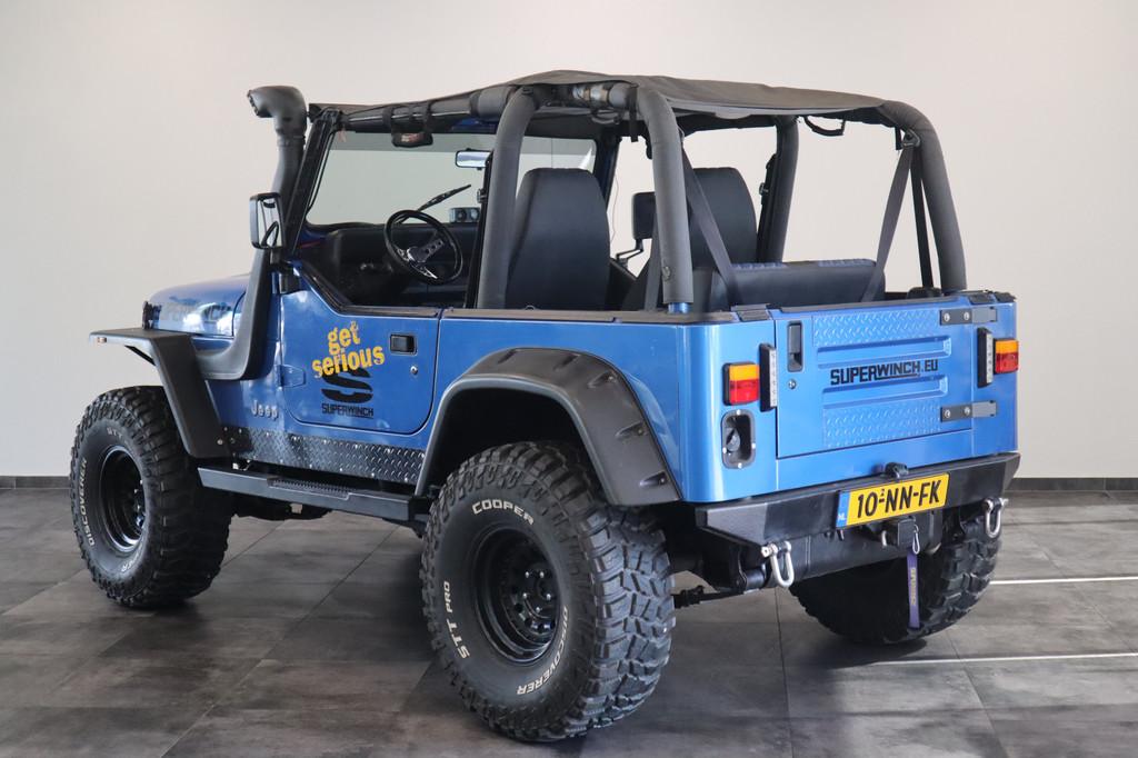 Jeep Wrangler 4.0i Softtop 4WD Luxe Leder Automaat Uniek LED, Cabriolet, Blauw, Leder, Vierwielaandrijving