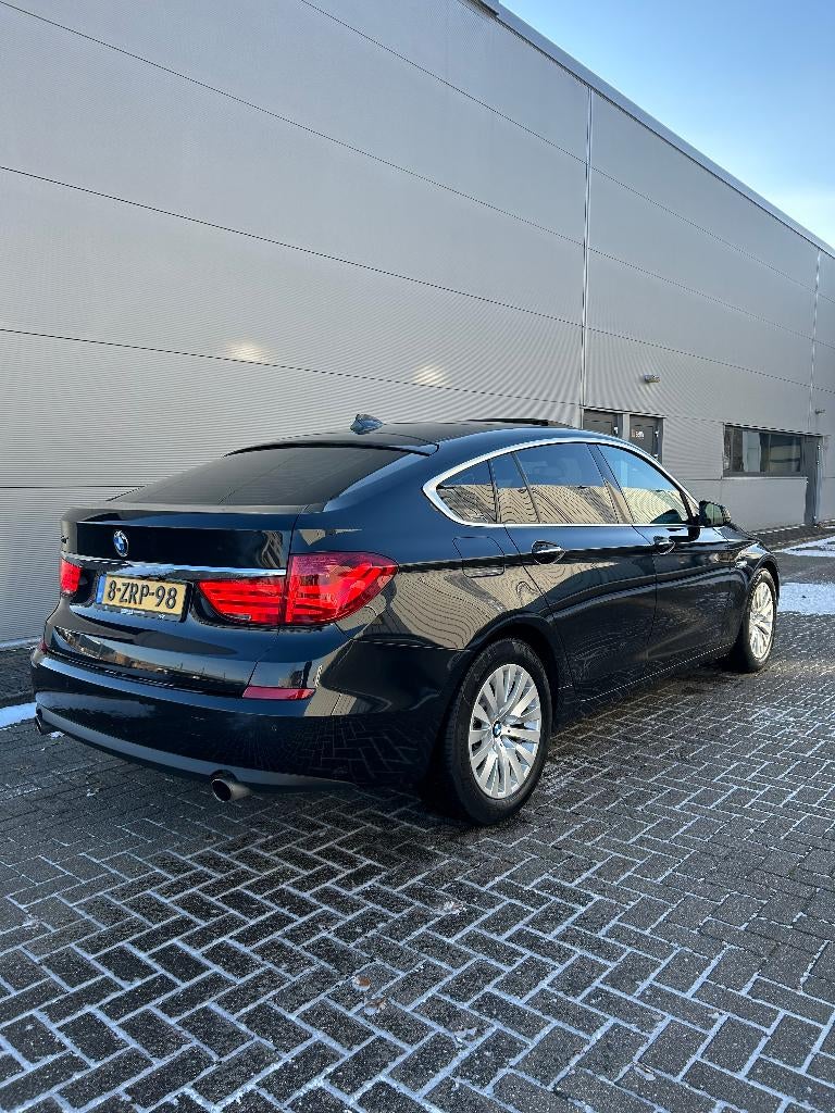 BMW 5-Serie GT 535I HIGH EXECUTIVE 2009 ZWART, Auto's, BMW, Bedrijf, 5-Serie GT, ABS, Achteruitrijcamera, Adaptieve lichten, Airbags