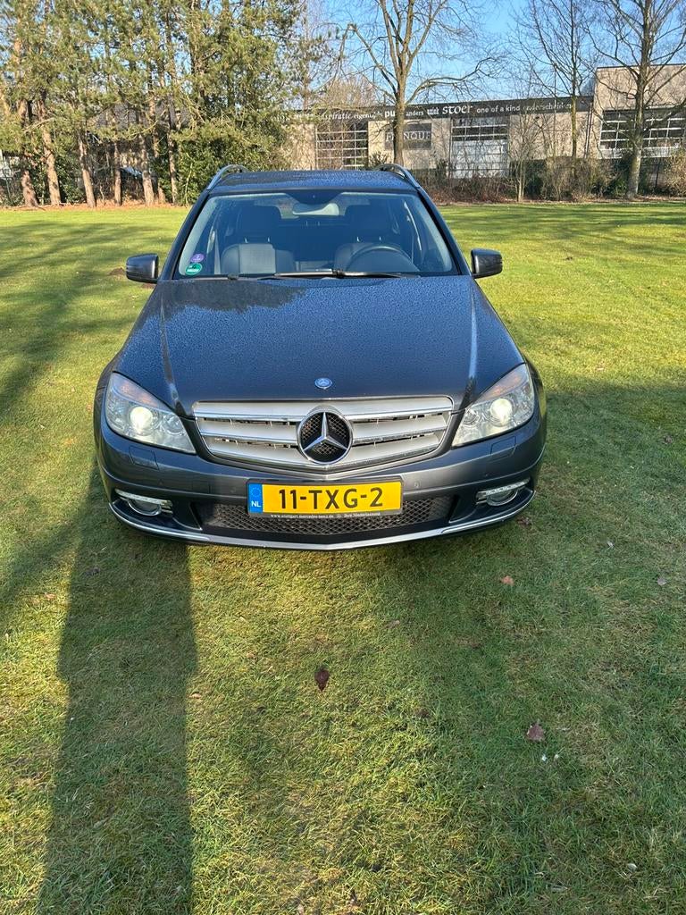 Mercedes-Benz C-Klasse C200 BE Estate Aut7 2010 Grijs, Auto's, Euro 5, Achterwielaandrijving, 1800 kg, Zwart
