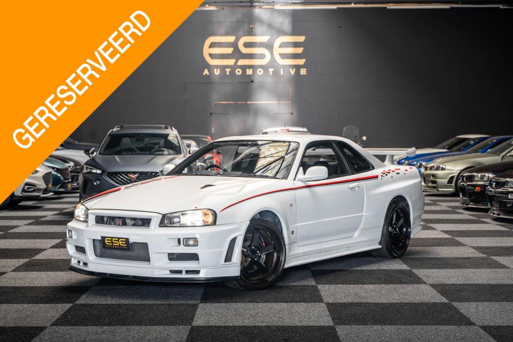 Nissan Skyline R34 GTR V-spec II QM1 White, Auto's, Stof, Gebruikt, Handgeschakeld, Vierwielaandrijving