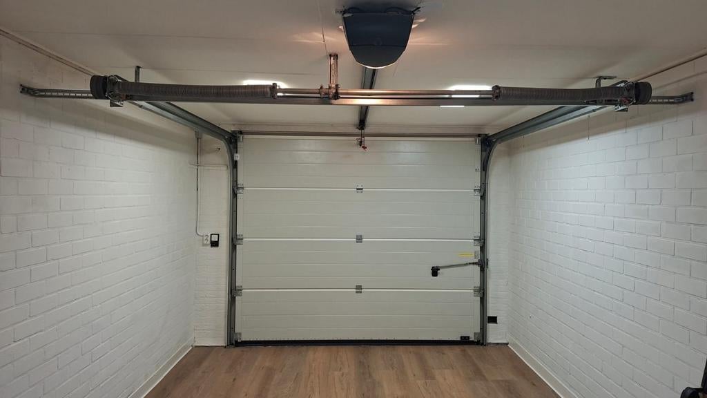 Sectionele garagedeur met toegangssysteem, Doe-het-zelf en Verbouw, Deuren en Horren, Ophalen, Gebruikt, Garagedeur, 120 cm of meer