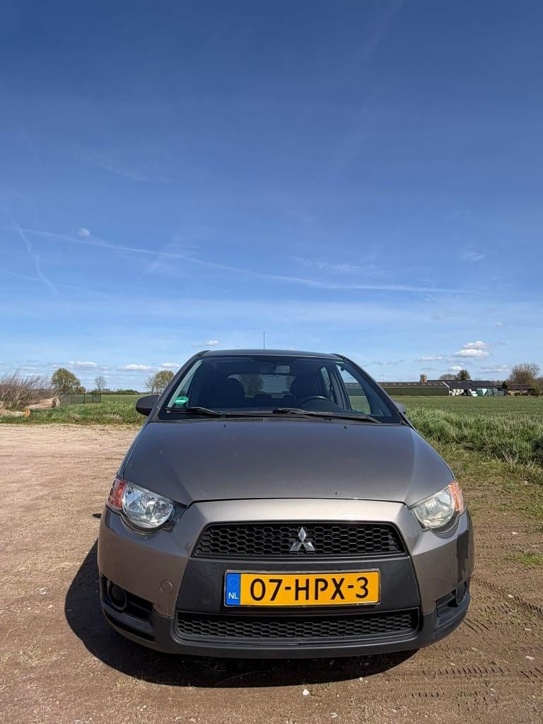 Mitsubishi Colt 1.3 5-DR AUT 2009 Grijs, Auto's, Stof, 31 €/maand, Colt, Origineel Nederlands
