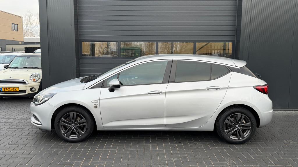 Opel Astra 1.4 Turbo 120 Jaar Edition Airco|Cruise, Gebruikt, Euro 6, 150 pk, 620 kg