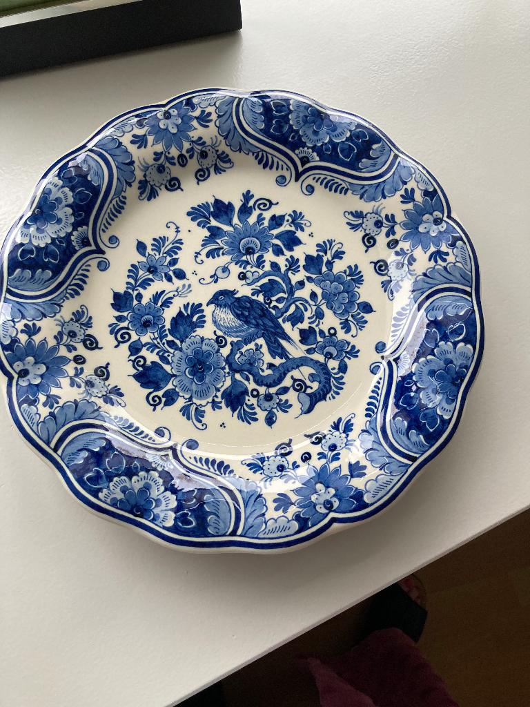 Delfts blauw bord, Ophalen