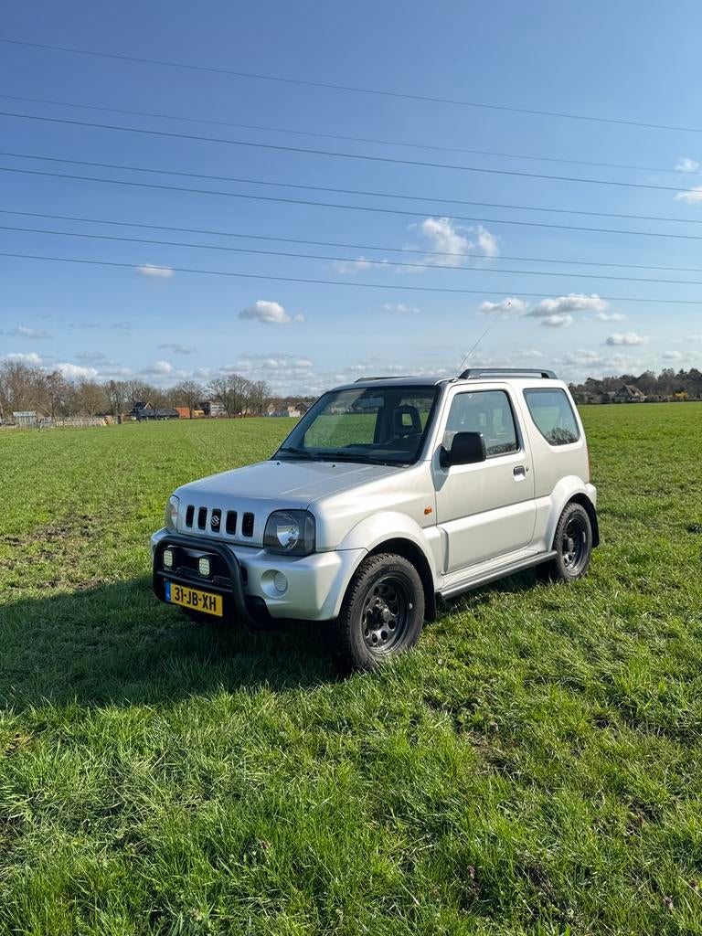 Suzuki Jimny 1.3 JX 4WD 2002 Grijs, 13 km/l, Stof, 40 €/maand, 4 cilinders