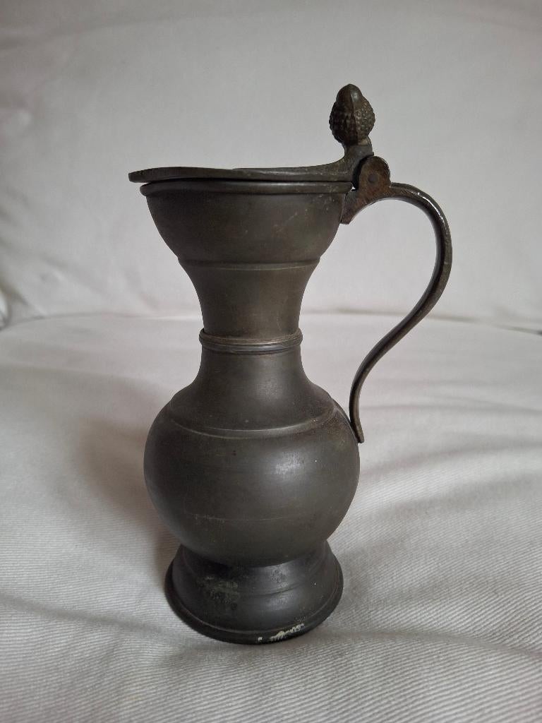 Tinnen Eikeltjes kan, Ophalen