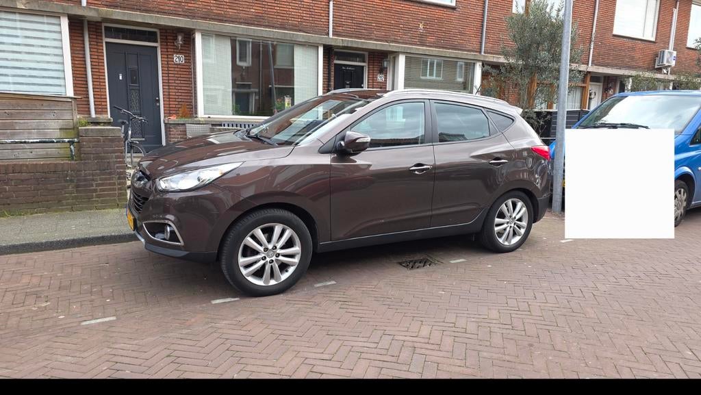 Hyundai iX35 2.0 I Cvvt 4WD 2012 Bruin, 13 km/l, 1998 cc, Zwart, 4 cilinders