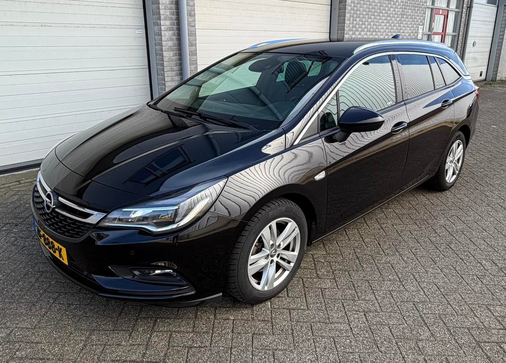 Opel Astra sports tourer innovation  1.4 Turbo 150pk Aut, Zwart, Zwart, Leder, 1240 kg