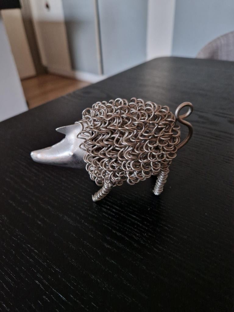 Uniek metalen schaapje, Ophalen