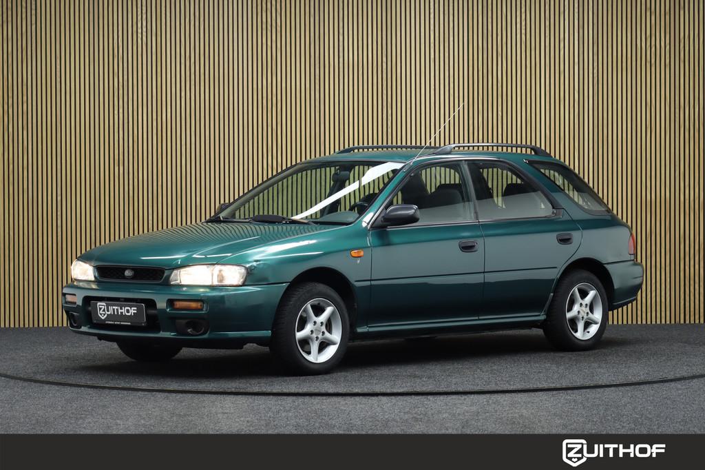 Subaru Impreza Plus 1.6 GL AWD | 1-Ste Eigenaar | Trekhaak |, Auto's, Stof, Gebruikt, 4 cilinders, Origineel Nederlands
