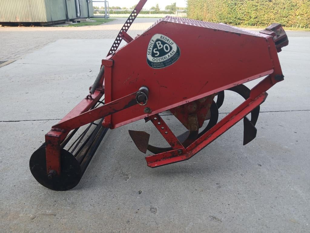 Spitmachine  sbo, Ophalen