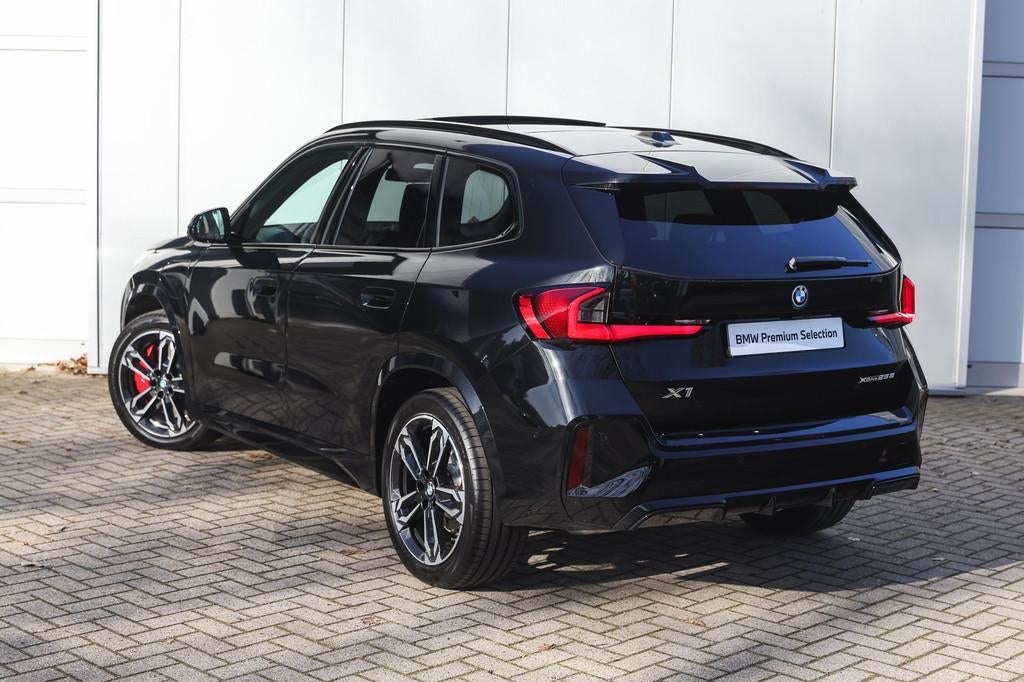 BMW X1 xDrive25e High Executive M Sport Automaat / Panoramad, Euro 6, Met garantie (alle), Zwart, Hybride Elektrisch/Benzine