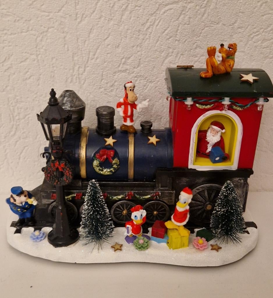 Kerst treintje met Disney 1
Met o.a
Minnie.donald.pluto., Ophalen of Verzenden, Mickey Mouse, Beeldje of Figuurtje