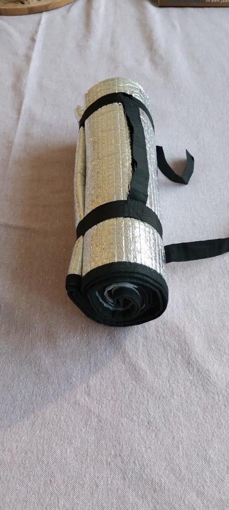 Isoleermatje extra warmte., Ophalen