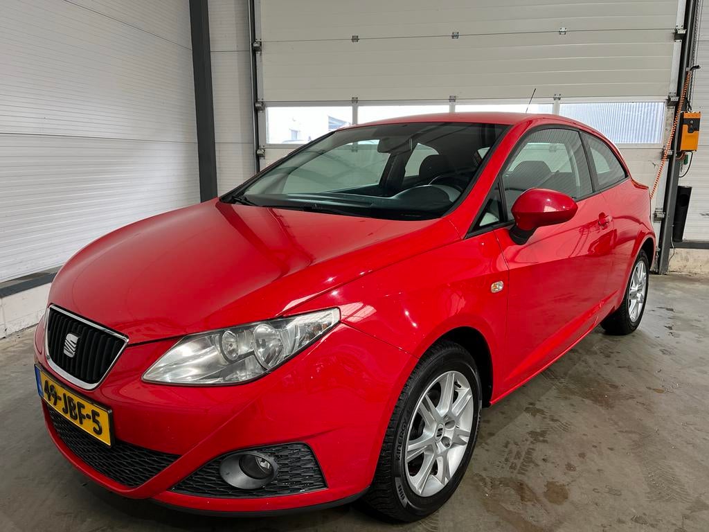 Seat Ibiza 1.2 51KW 3DRS 2009 Rood, Auto's, Seat, Voorwielaandrijving, Stof, 1198 cc, Ibiza