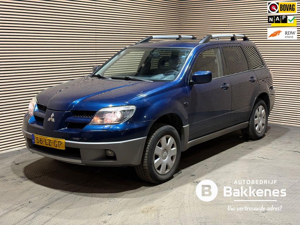 Mitsubishi Outlander 2.0 Sport 4WD | LPG | Airco | APK 12-20, Auto's, 136 pk, Zwart, 4 cilinders, Blauw