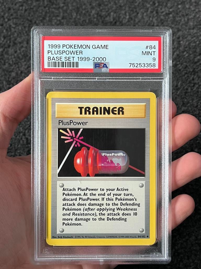 Pokémon PSA 9 Trainer Pluspower #84 Base set TCG, Ophalen of Verzenden, Zo goed als nieuw, Losse kaart, Foil
