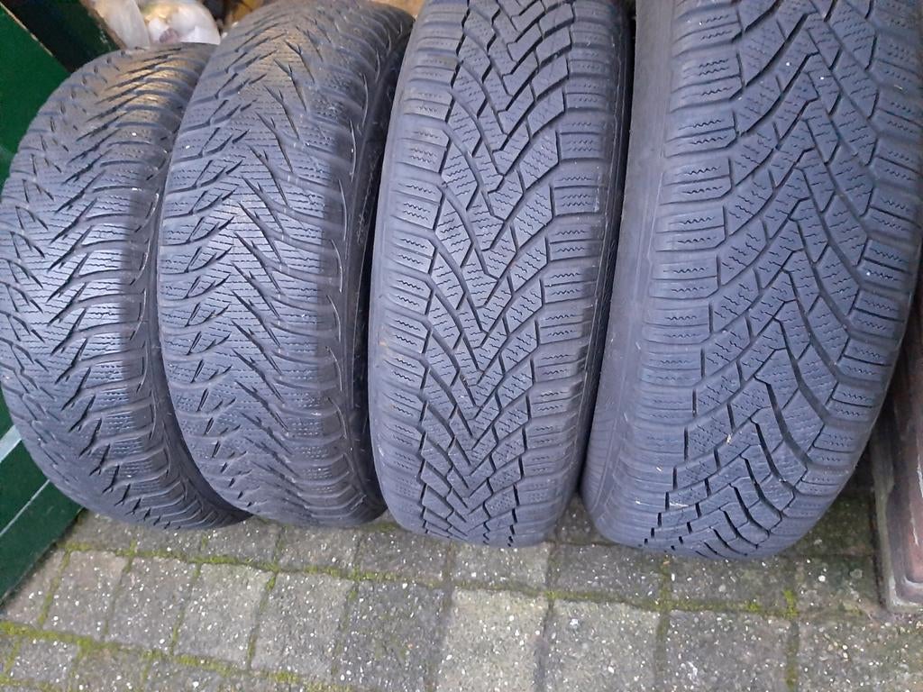 Set van winterbanden 185/65R15, Ophalen