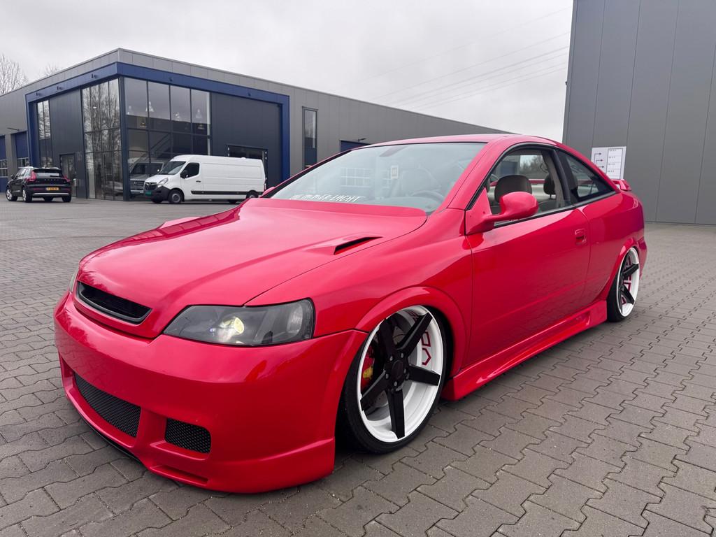 Opel Astra Coupé 1.8-16V Airride vossen 29k taxatie Uniek e, 1160 kg, Beige, 4 cilinders, 4 stoelen