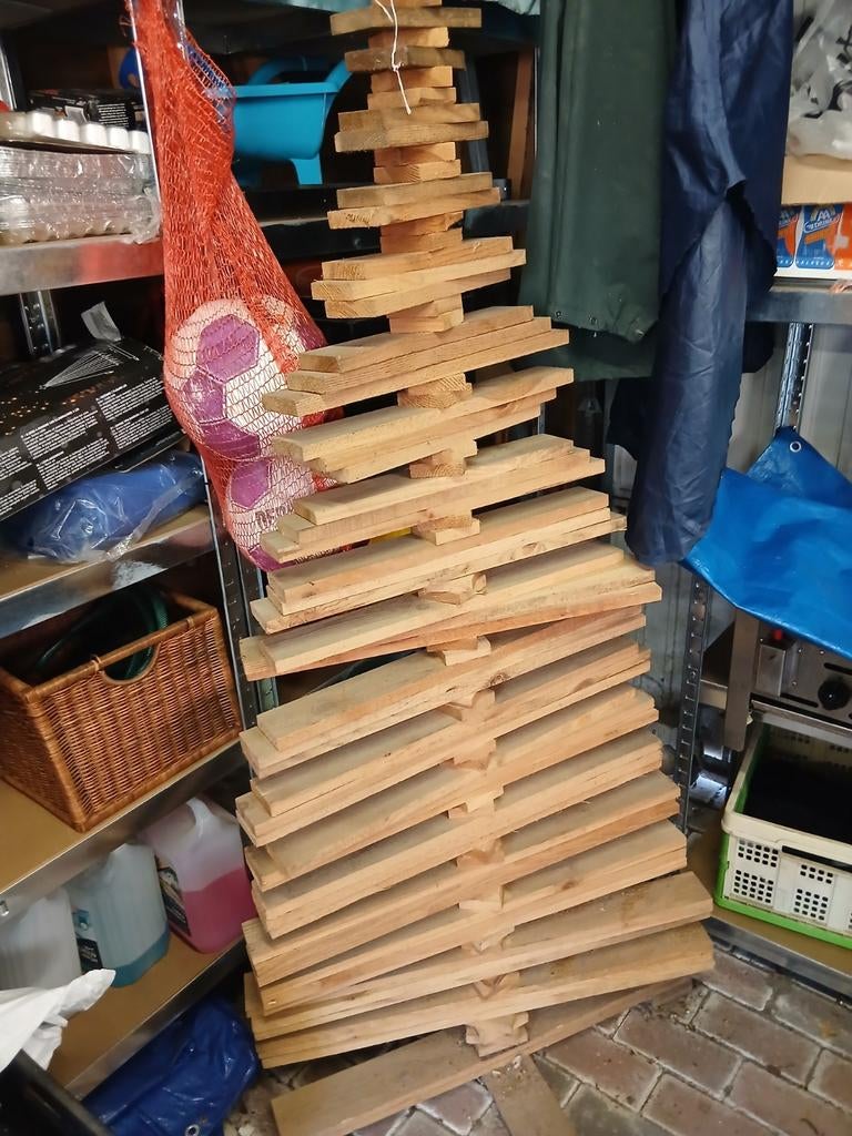 Houten kerstboom, Ophalen