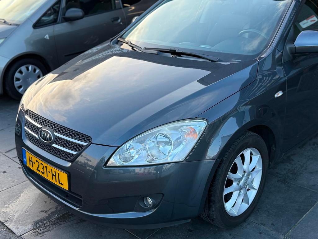 Kia Cee'd Sporty Wagon 1.6 X-clusive|AUTOMAAT|Airco|PDC|APK, Auto's, Kia, Gebruikt, 4 cilinders, Met garantie (alle), 14 km/l